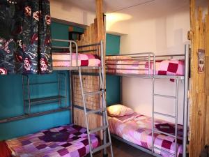a bunk bed room with two bunk beds in it at SURF HOSTEL BIARRITZ in Biarritz