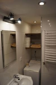 Kúpeľňa v ubytovaní Apartament Zielony Legionów 90