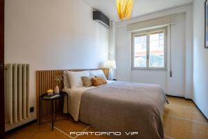 Tempat tidur dalam kamar di Ma Maison en Italie by PortofinoVip