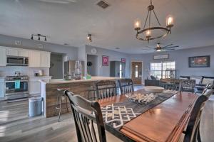 a dining room and kitchen with a table and chairs at San Antonio Retreat, Close to Seaworld! in San Antonio