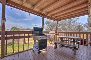 a grill and a picnic table on a deck at San Antonio Retreat, Close to Seaworld! in San Antonio