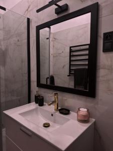 Kúpeľňa v ubytovaní Loft przy Placu Niepodległości