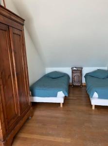 Posteľ alebo postele v izbe v ubytovaní La Maison de Garel