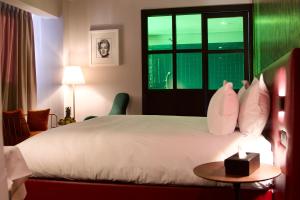 Ένα ή περισσότερα κρεβάτια σε δωμάτιο στο Boutique Hotel Gauthier Restaurant Terrasse