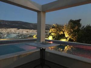 The swimming pool at or close to Athens Lycabettus Hill Penthouse, Private Roof Garden & Pool