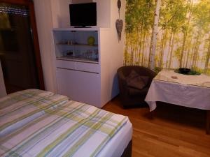 Postel nebo postele na pokoji v ubytování Almhaus Blümel
