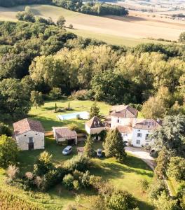 an aerial view of a house with a yard at La Palombière in Saint-Clar