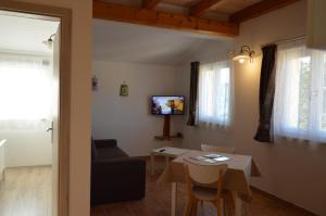 TV a/nebo společenská místnost v ubytování Residence Mama