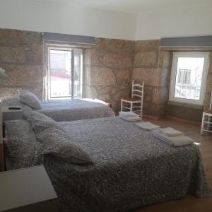 Posteľ alebo postele v izbe v ubytovaní Casas Ti Flores
