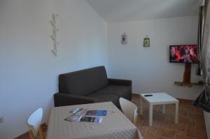 TV a/nebo společenská místnost v ubytování Residence Mama