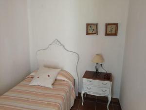 A bed or beds in a room at Casa La Higuera
