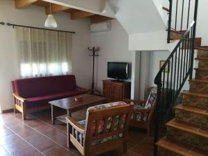 A television and/or entertainment centre at Casa La Higuera