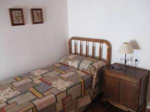 A bed or beds in a room at Casa La Higuera