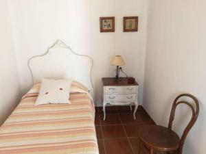 A bed or beds in a room at Casa La Higuera