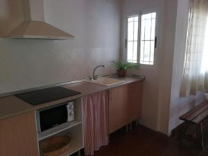 A kitchen or kitchenette at Casa La Higuera