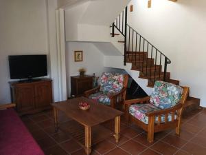 A television and/or entertainment centre at Casa La Higuera