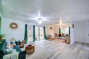 a living room with a couch and a table at 'Urban Green Living' in Houston