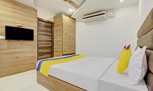 Postel nebo postele na pokoji v ubytování Itsy Hotels O3 + 30 fotografií