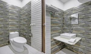 Koupelna v ubytování Itsy Hotels O3