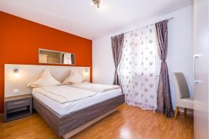 Łóżko lub łóżka w pokoju w obiekcie Villa Dalmatina Zadar mit Pool