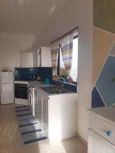 Cucina o angolo cottura di A.M.A Appartament