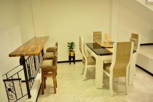 a dining room with a table and chairs at Hostal Sol Naciente in Alcalá