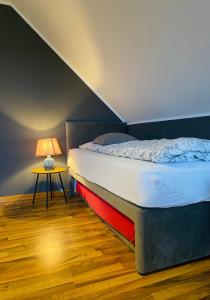 Postel nebo postele na pokoji v ubytování Lily-Rose Cottage