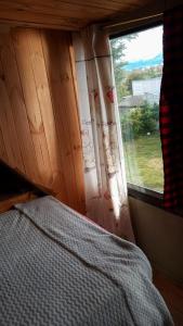 Ліжко або ліжка в номері La alpina de YOLI