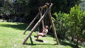 Parquinho infantil em Pousada Cabanas da Serra Lumiar
