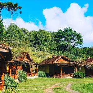 Um jardim em Pousada Cabanas da Serra Lumiar