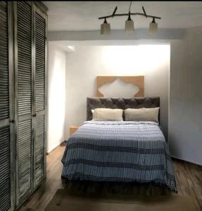 Кровать или кровати в номере Göcek quaite private appartment