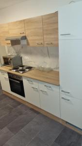 Kuchyň nebo kuchyňský kout v ubytování Casa Rustica I Free Parking I Self Check-in