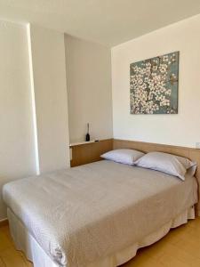 Postel nebo postele na pokoji v ubytování Estudio soleado y bien ubicado
