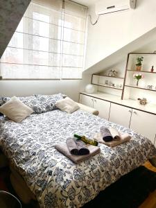 Ένα ή περισσότερα κρεβάτια σε δωμάτιο στο TRIANGLE CITY Apartment 1