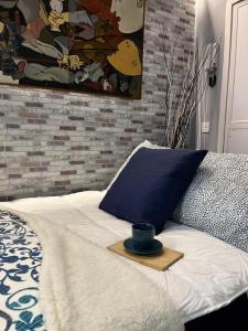 Łóżko lub łóżka w pokoju w obiekcie Coqueto apartamento muy céntrico