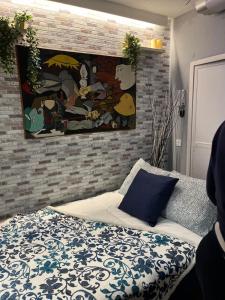 Łóżko lub łóżka w pokoju w obiekcie Coqueto apartamento muy céntrico