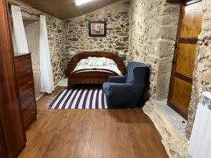 A bed or beds in a room at Casa Xulián Még 8 kép