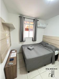 Postel nebo postele na pokoji v ubytování MSHome - Apartamento Térreo com Varanda e Mobiliado + 23 fotografií