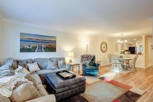 a living room with a couch and a table at Springwood Villas 21 in Hilton Head Island