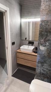Postel nebo postele na pokoji v ubytování NordiK