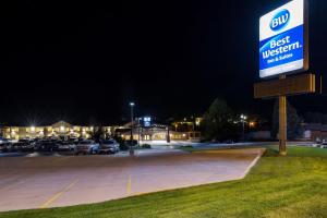 a best western sign in a parking lot at night at Best Western Golden Spike Inn & Suites in Hill City