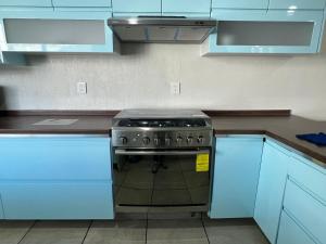 Kuchyň nebo kuchyňský kout v ubytování CASA EL CHALET