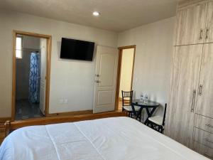 Postel nebo postele na pokoji v ubytování CASA EL CHALET