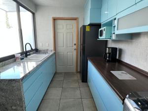 Kuchyň nebo kuchyňský kout v ubytování CASA EL CHALET