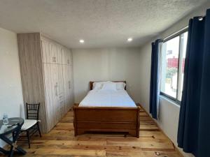Postel nebo postele na pokoji v ubytování CASA EL CHALET