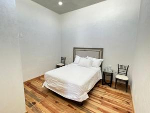 Postel nebo postele na pokoji v ubytování CASA EL CHALET