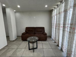 Posezení v ubytování CASA EL CHALET