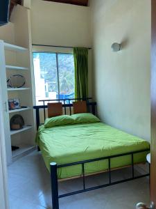 En eller flere senge i et værelse på Apartamentos Playa rodadero