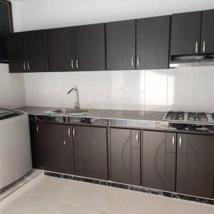 Kuchyň nebo kuchyňský kout v ubytování lujoso apartamento