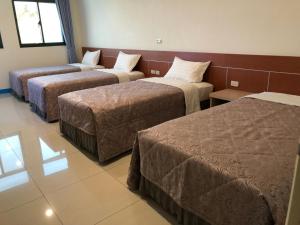 Letto o letti in una camera di Lohas Seaview B&B